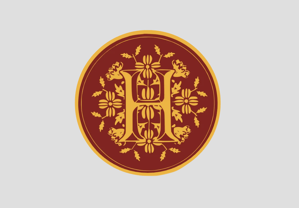 Final Hoover House crest: an ornate H framed by flowers and oak leaves in gold on deep red, inside a gold ring