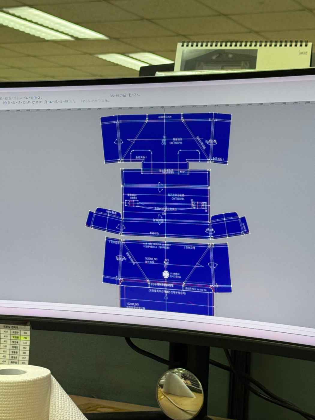 Digital pattern pieces for the bag on a CAD screen